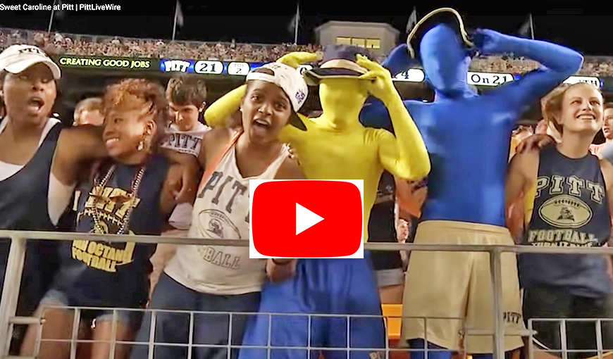 Pitt students sing "Sweet Caroline" at football game.